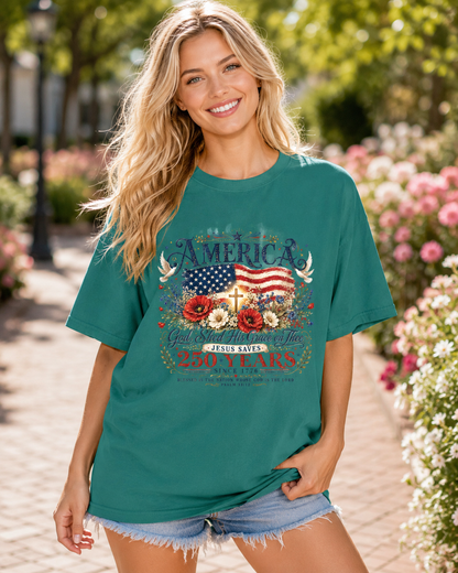 DailyFits America 250 Years Christian T-Shirt | God Shed His Grace Jesus Saves Patriotic USA Faith